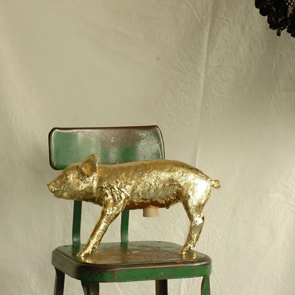 Areaware Reality Bank in the Form of a Pig - Gold Chrome